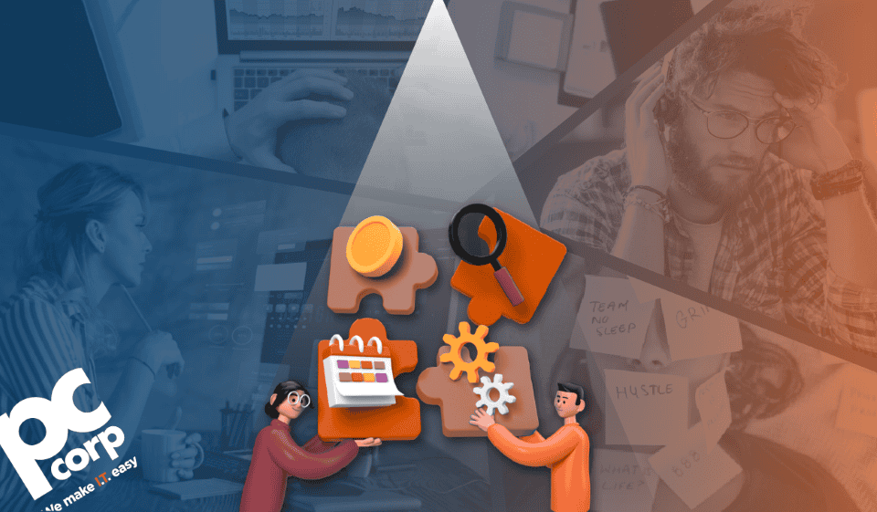 A branded PC Corp blog banner featuring a split blue and orange overlay with images of professionals working on computers in the background. In the center, illustrated figures assemble large puzzle pieces displaying icons such as a calendar, magnifying glass, gear, and coin, representing organized IT systems, support, and operational efficiency. The PC Corp logo appears on the left. The visual supports the theme of simplifying technology for SMBs through managed IT services.